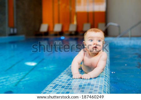little beautiful boy in the pool. prevention of diseases of the musculoskeletal system.  health