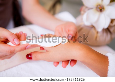 spa treatments for hands, hand care, health and beauty of hands, the girl in a beauty salon, body care