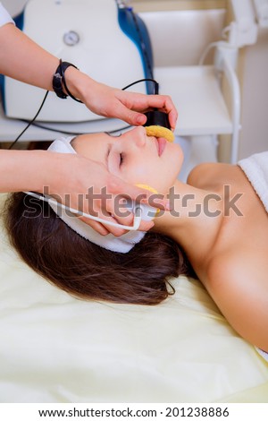 cosmetic procedures. beautiful girl on reception at the beautician,  health, healthy facial skin, facial