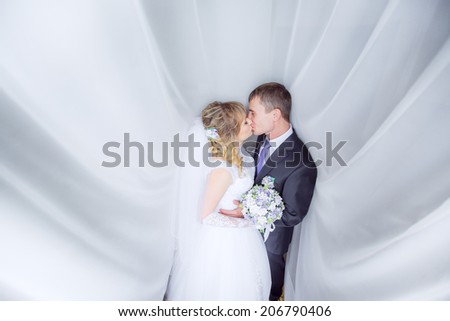 portrait of the newlyweds in the room