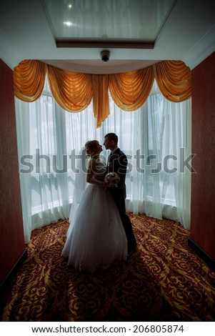 silhouette of the couple in the room