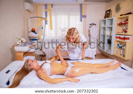 body care, skin mask, cream, beautiful girl on reception at the beautician,  Health