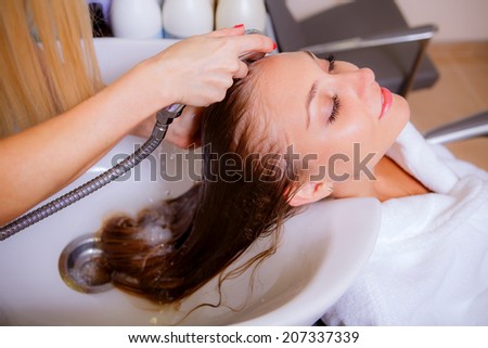hairdresser washes head  girl, beauty, health,  close-up