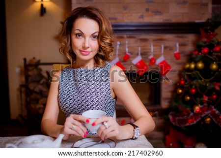 beautiful girl at the holiday table. Christmas holidays. Christmas decor. new year