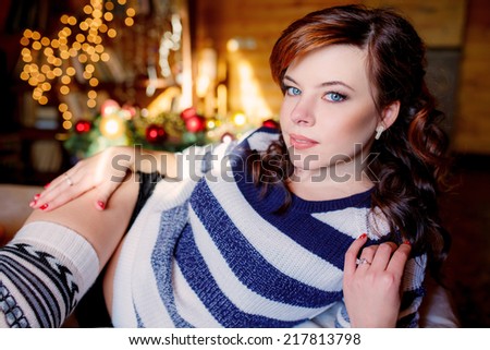 beautiful girl in the winter house. winter. christmas, family holidays
