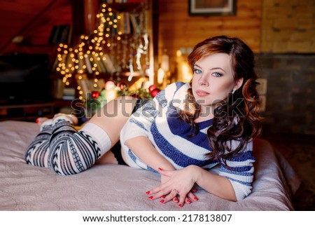 beautiful girl in the winter house. winter. christmas, family holidays
