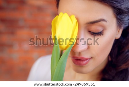 beautiful girl with tulips. close-up, International Women\'s Day, Valentine\'s Day