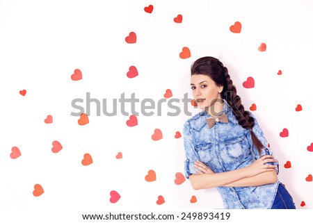 Beautiful girl. on the background with hearts. close-up, International Women\'s Day, Valentine\'s Day, March 8, Mother\'s Day