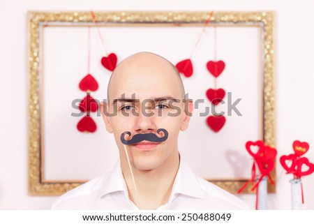 handsome guy with a mustache on Valentine\'s Day