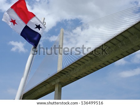 Panamanian Flag And Centennial Bridge Over The Panama Canal. Photo Taken While Cruising Through The Canal.