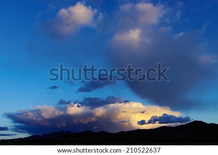 Rapidly evolving storm clouds in Death Valley (California). Photo taken as the sun was setting.
