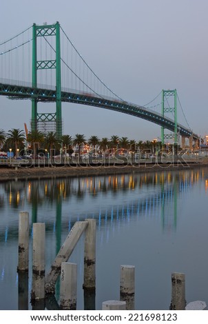 Vincent Thomas Bridge.The bridge is a 1500-foot-long suspension bridge, crossing the Los Angeles Harbor in the state of California, linking San Pedro (City of Los Angeles) with Terminal Island.