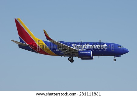 LOS ANGELES, CA, USA - MAY 25 - a Southwest Airlines jet (Boeing 737) arriving at the Los Angeles International Airport (LAX) is shown on May 25, 2015 in Los Angeles, California, USA