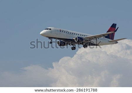 LOS ANGELES, CA/USA - JUNE 6 2015: Delta Connection Embraer 175 (reg N609CZ) arriving at the Los Angeles World Airport (LAX).