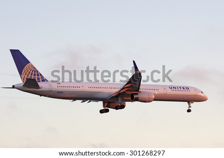 LOS ANGELES, CA/USA - JULY 24 2015: Photo of a United Airlines Airlines aircraft (Boeing 757, registration N57857) shown before landing at the Los Angeles World Airport (LAX) shortly before sunset.