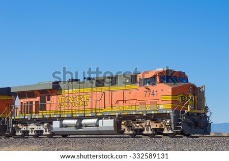ORO GRANDE, CALIFORNIA/USA - OCTOBER 24 2015: Distinctive BNSF Railway locomotive freight train No. 7741 idle. The BNSF Railway is one of the largest freight railroad networks in North America.