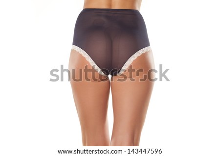 Rear view of a woman's buttocks and panties with high waist