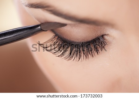 Woman Applying Eyeshadow