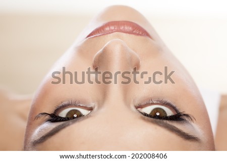 female eyes with long false eyelashes