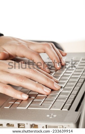 Ladies fingers to the keyboard of the laptop