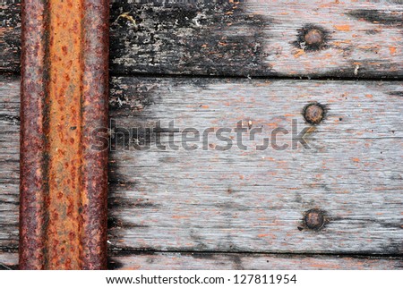 The old wood texture on the ole truck floor with metal line background