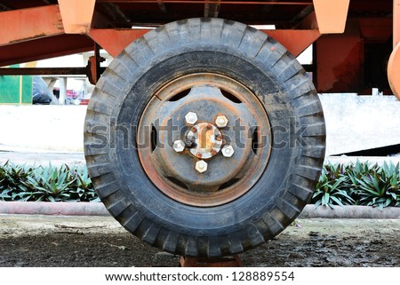 The old truck tire on the very old truck