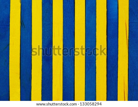 Blue and yellow wood separated to background