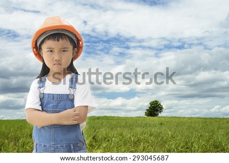 Sugar cane field in the blue sky and cloudy day with kid thinking to plan