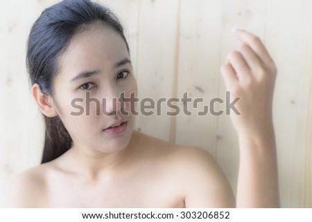 woman portrait with blur wood texture