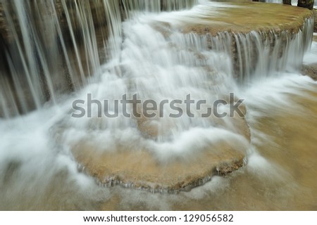 Waterfall  in spring season located in deep rain forest jungle