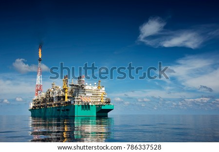FLNG or floating liquefied natural gas at sea during sunny day