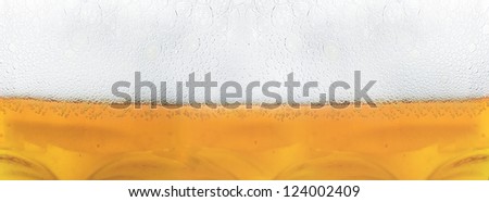 Pouring of beer bubbles background