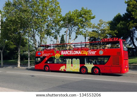 BARCELONA - AUGUST 21:Barcelona City Tour is a official touristic bus service that shows the city with an audio guide, August 21, 2012, in Barcelona, Spain.