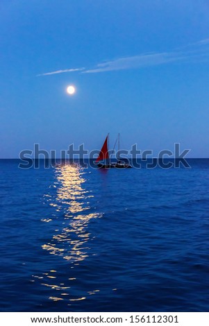 boat scarlet sail and moon on blue ocean wave