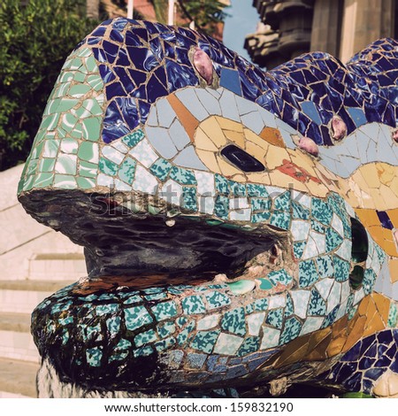 Vintage background Lizard mosaic in Park Guell in Barcelona, Spain.