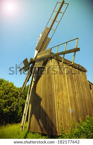 Wooden windmills old near the village in Folk Arts museum Pirogovo, Kiev, Ukraine