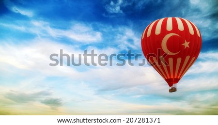 turkey flag hot air balloon flying blue sky with clouds