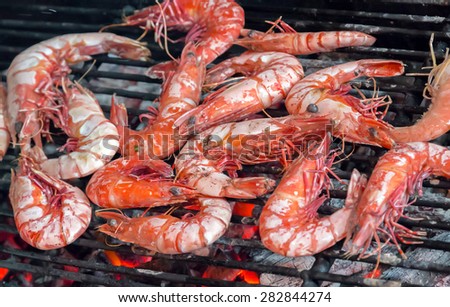 grilled or barbecued big shrimps cooking seafood. background eat Restaurant