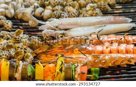Grilled sea food on the grill. background eat Restaurant