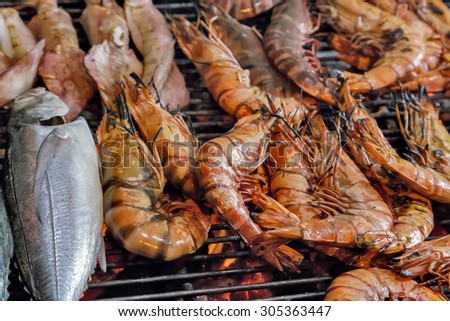 Grill prawn cooking seafood street food and beach bbq