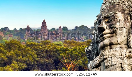 Ancient stone faces of king Bayon Temple Angkor Thom, Cambodia. Ancient monument Khmer architecture Kampuchea.