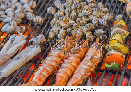 shrimp grilled barbecued seafood in BBQ Flames.