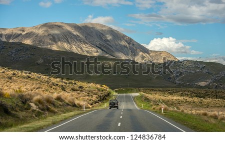 Beautiful landscape mountains and lake, Lupines fields, south island, New Zealand