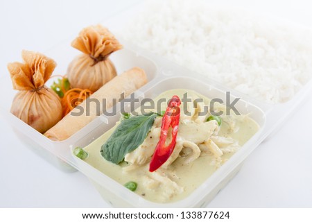 Thai take away food, green curry and spring roll with rice