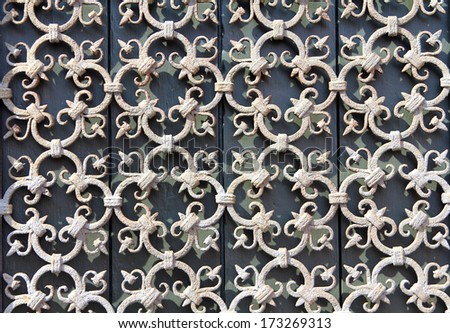 decorative wrought-iron grille on the window