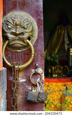 Entrance door of ancient taoist temple, China