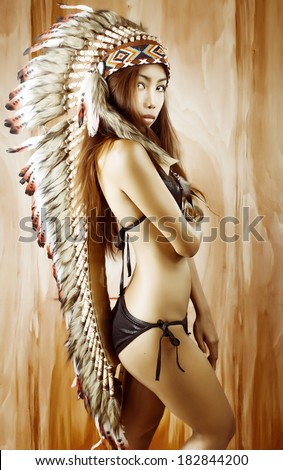 Native American, Indians in traditional dress, standing in profile, American indian Girl, background made of wood, black and white