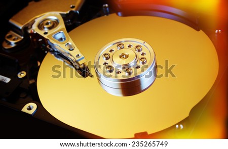 HDD open with visible cylinders and writing printing heads