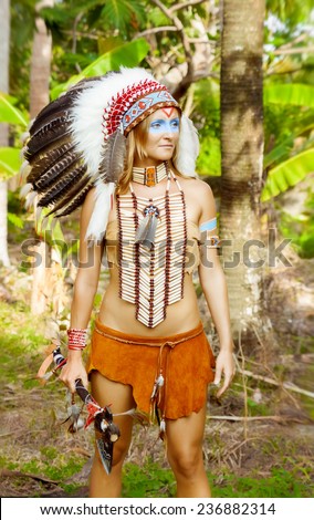 Native American, Indians in traditional dress, standing, rice field, day time, ax tomahawk