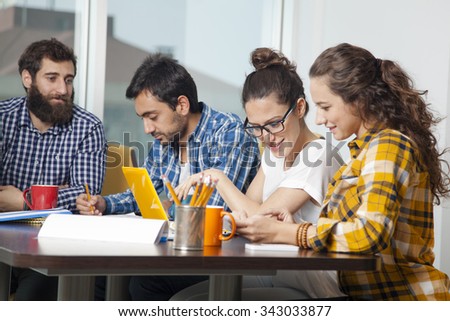 Group of people working together at office